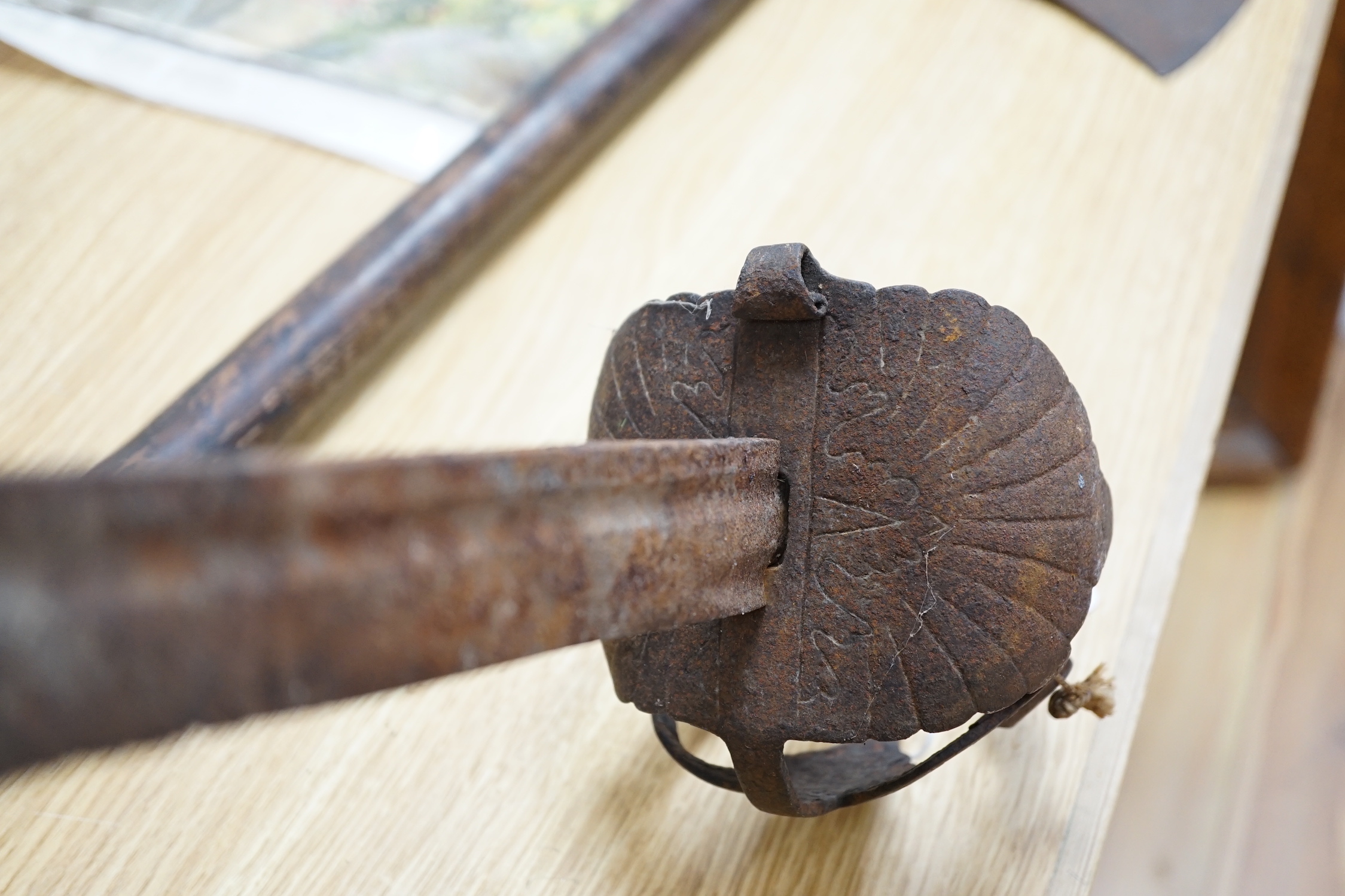 An early pike, a basket hilt sword and a French bayonet. longest 193cm